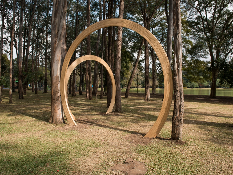 Installation view of two Growth Rings sculptures by Oscar Tuazon in a park